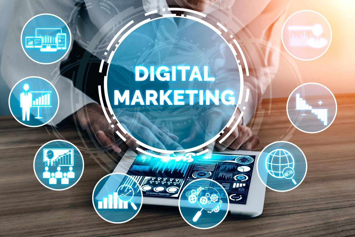 Digital marketer using a tablet with digital marketing and analytics icons